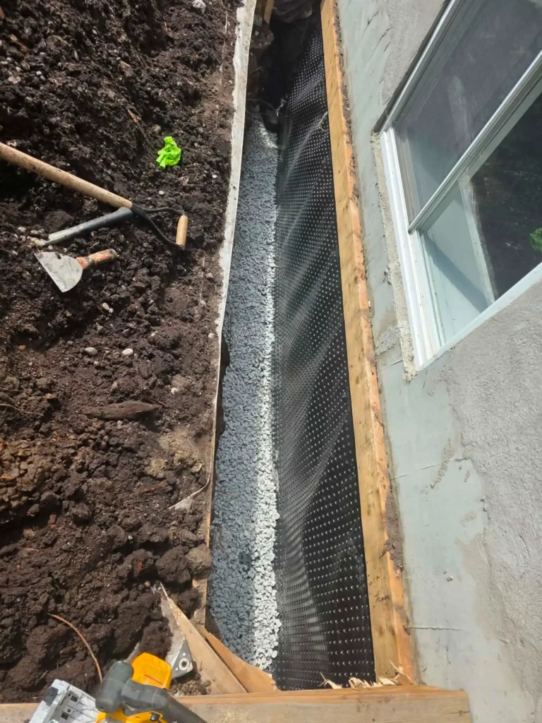 weeping tile clear gravel drainage installation innisfil